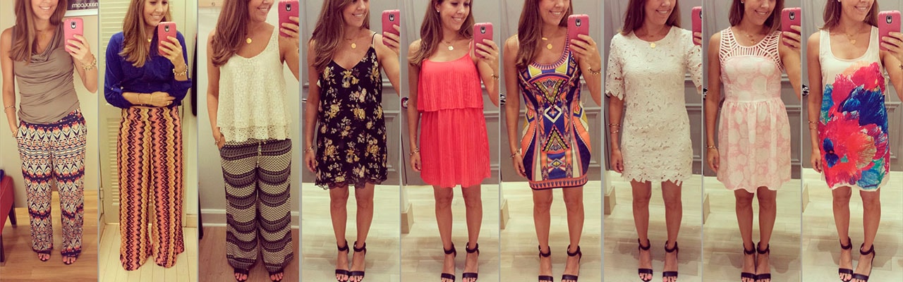 woman taking a mirror shot with phone wearing nine different outfits