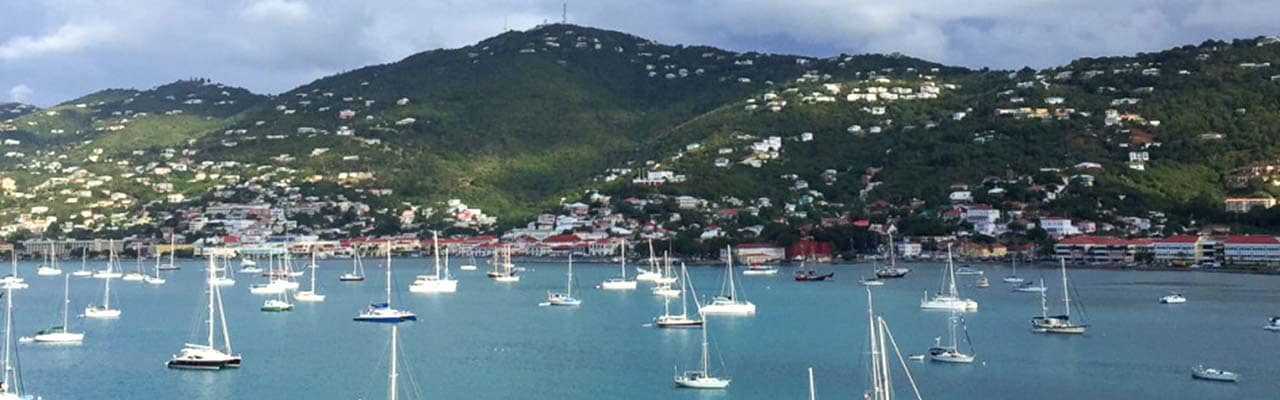 multiple sailboats docked in St. Thomas in the bay