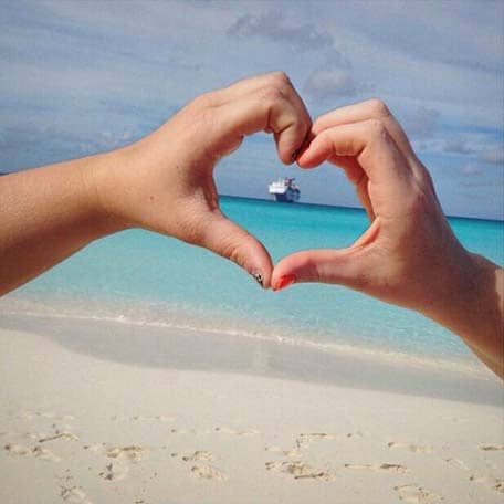 Head heart gesture on the beach of Half Moon Cay