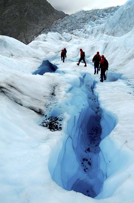group of hikers at mendenhall glacier