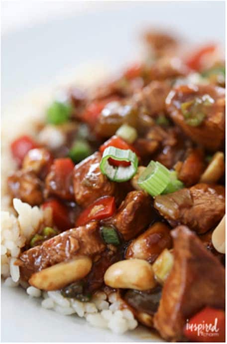 Close up of Kung Pao Chicken dish over rice