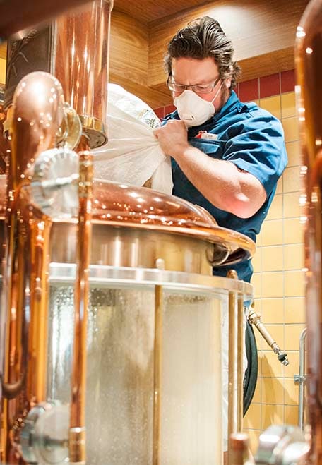 Brewmaster in the process of making beer on Carnival Vista