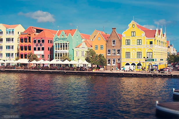 Colorful buildings lined up along the water in Curacao