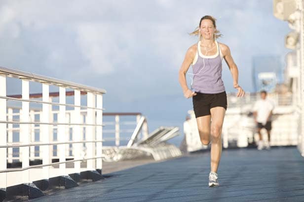 woman running on the jogging track on a carnival ship