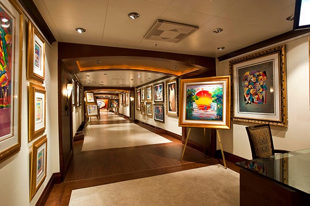 art displayed in a gallery onboard