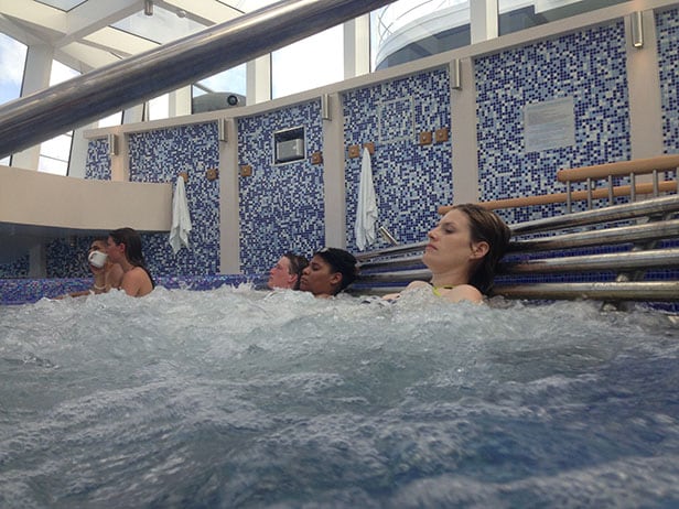 guests relaxing in a spa whirlpool at cloud 9 spa