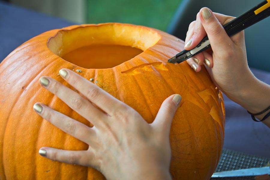 carving pumpkins for Halloween