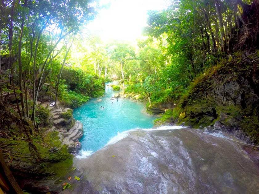 view of the irie blue hole from top of the river fall