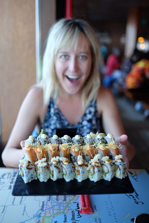 wife with plate of sushi