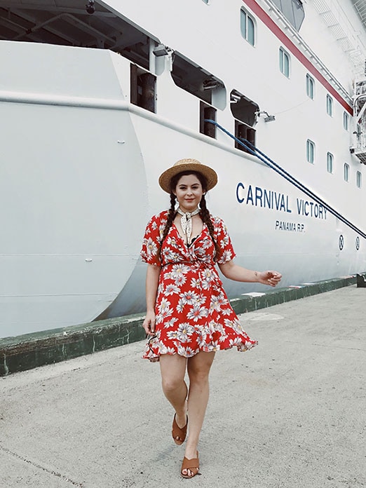 Noelle walking away from Carnival ship