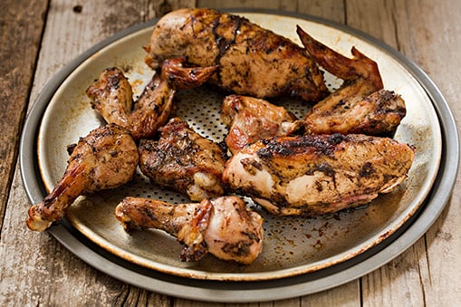 barbeque jamaican jerk chicken on a plate