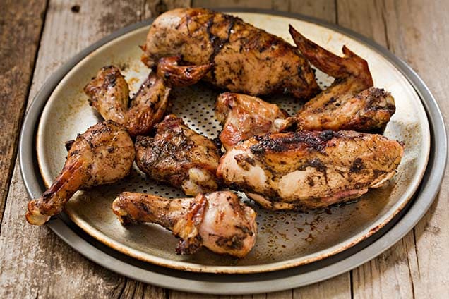 jamaican jerk chicken served on a plate 