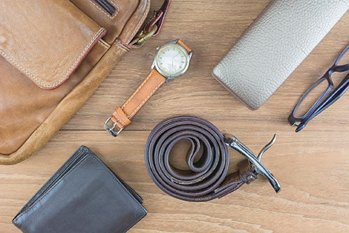 backpack, belt, watch, wallet and glasses case made from leather