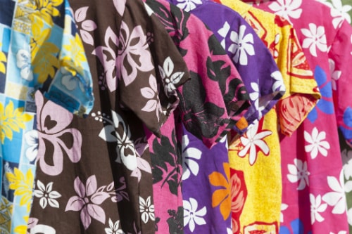 aloha shirts with floral designs and colors being sold in hawaii