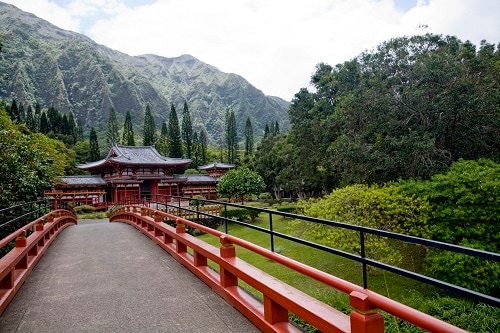 bridge leading to the buddhist byodo-in temple in hawaii 