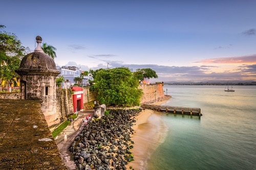 view of a castle wall near the shore of san juan, puerto rico
