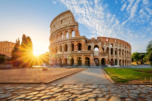 view of the coliseum in rome during the sun rise 