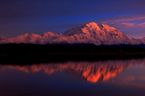 snowcapped mountains in alaska at sunset