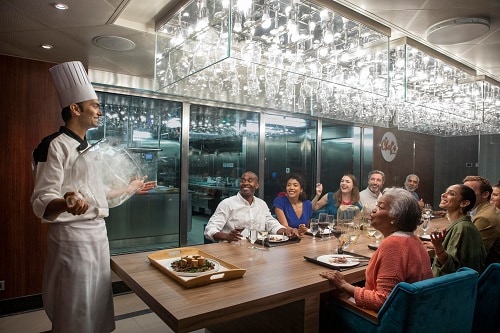 group of people enjoying an evening at the chef’s table