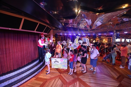 the seuss-a-palooza parade making its’ way through the carnival cruise ship