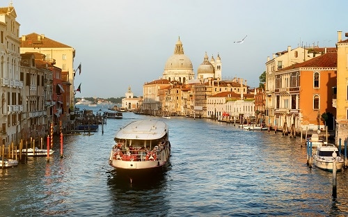 a vaporetto sailing along the waterways in venice