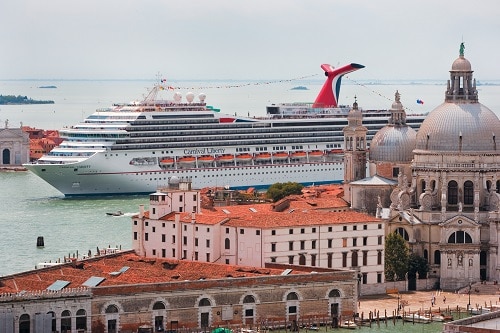 carnival ship pulling into the venice port in italy