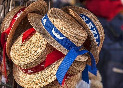 gondolier hats at a marketplace in venice