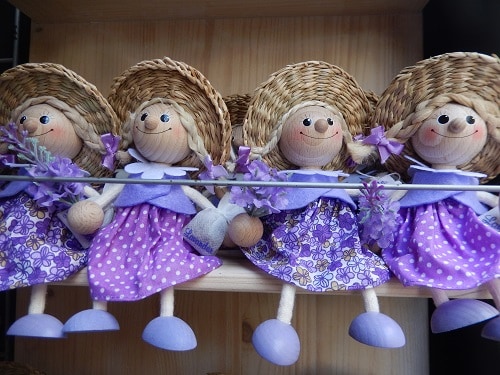 wooden doll souvenirs on display in croatia