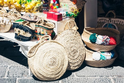 coffa bags and wicker bags for sale at a sicilian market