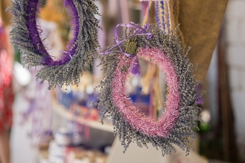 lavender wreaths hanging from a market in montenegro