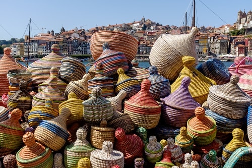 woven baskets for sale at a market in portugal