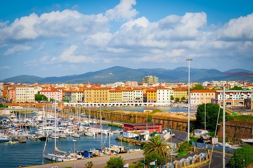 a panoramic view of a harbor in livorno, italy