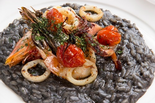 black risotto with tomato shrimp and octopus