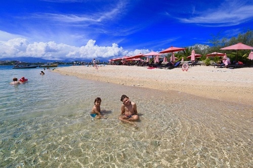 children playing on the beach in noumea