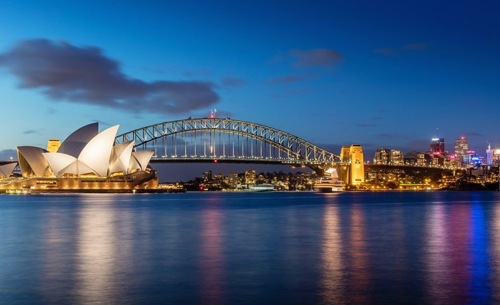 The Sydney Opera House and skyline at night