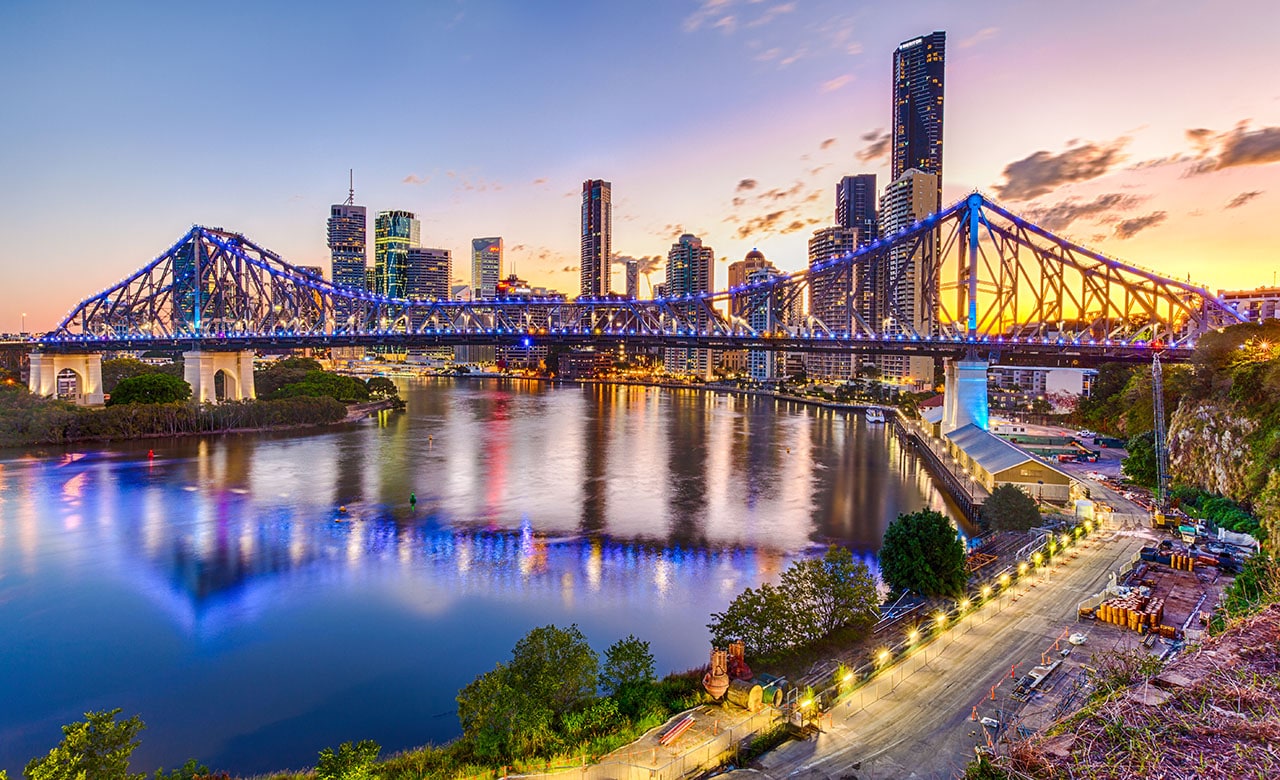 The Brisbane city skyline and bridge at night
