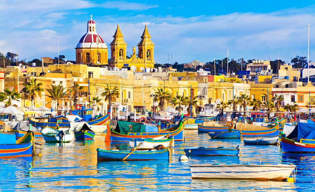 Colorful boats in the harbor of Malta
