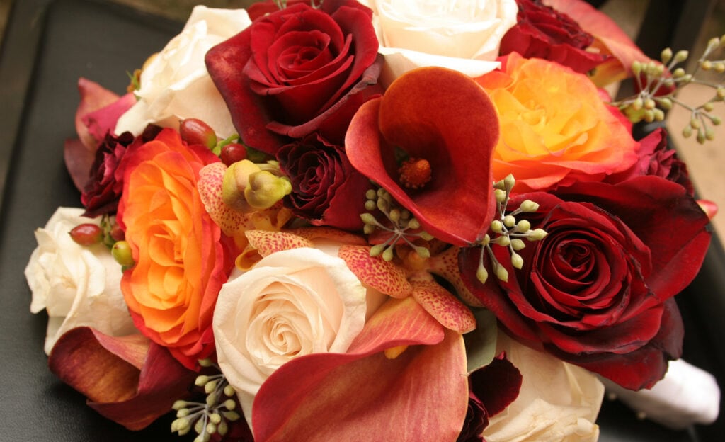 Red, orange, and white wedding bouquet 