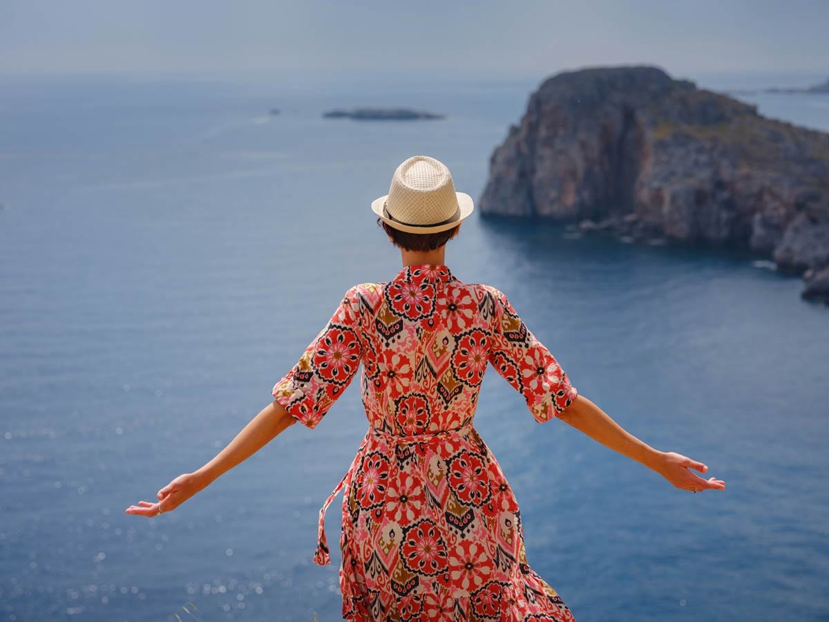 Woman viewing ocean alone