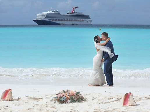 newlyweds kiss onshore